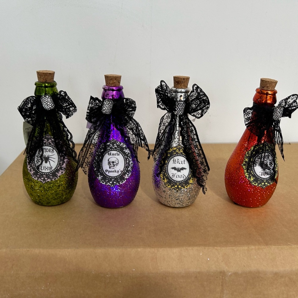 Set of Four unique Halloween Potion Bottles with Bows light up